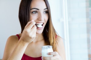 girl-eating-yogurt-resized-300x200